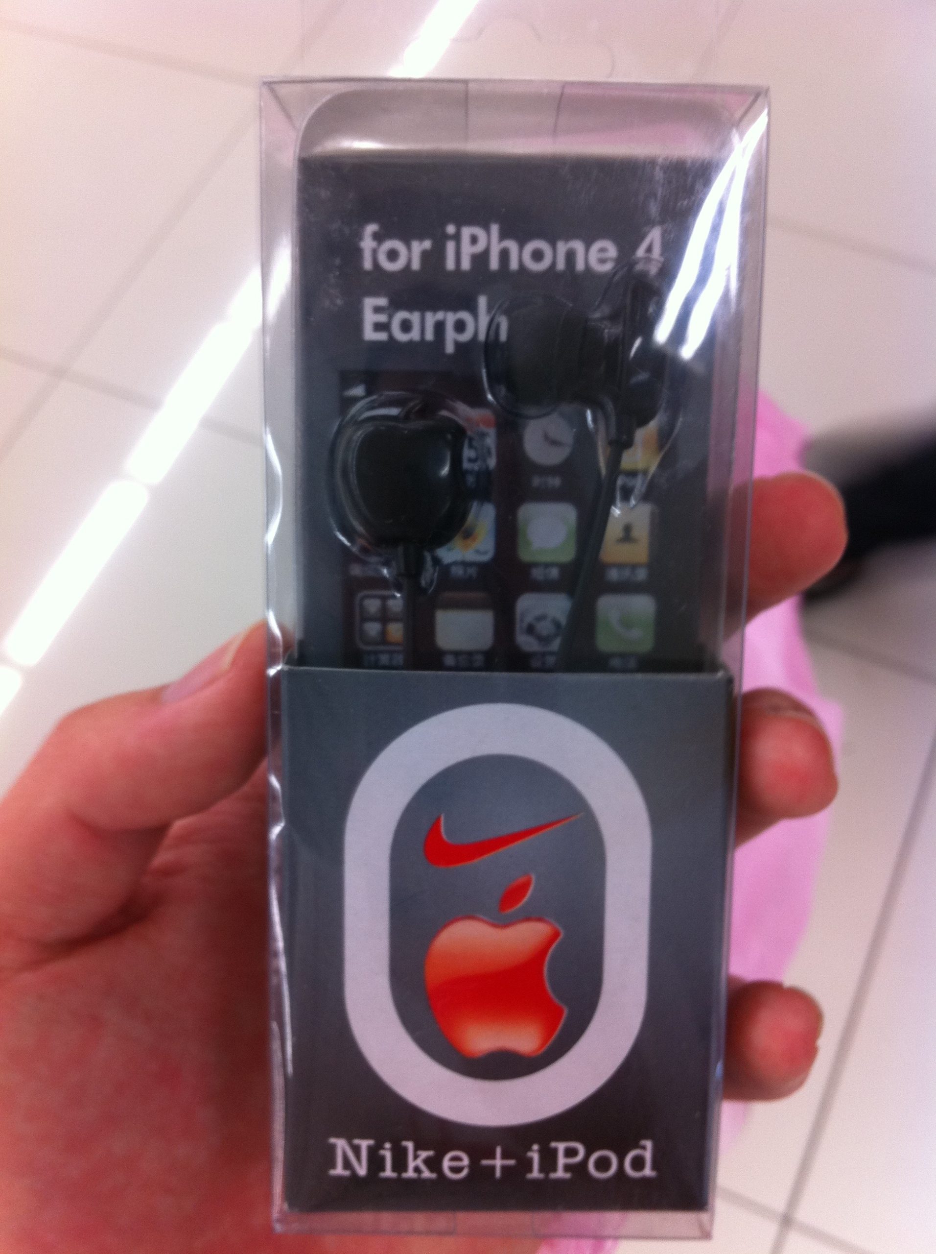 A package of earphones that indicate they're Nike + iPod
