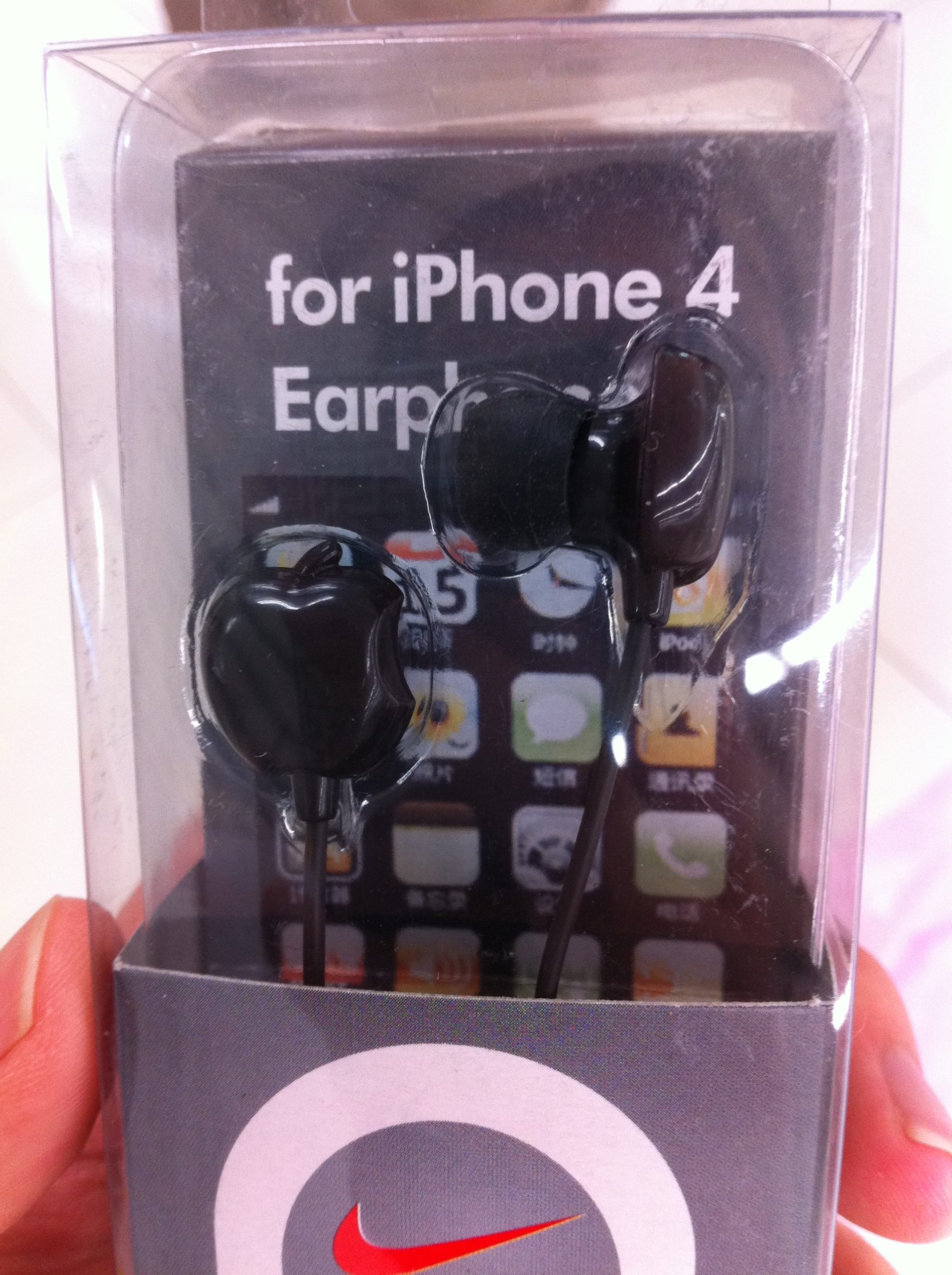 Earphones shaped like the Apple logo